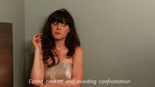 Jessica Day from New Girl saying that she's eating cookies and avoiding confrontation